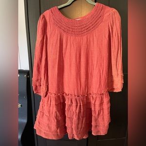 Burnt orange dress with ruffle bottom